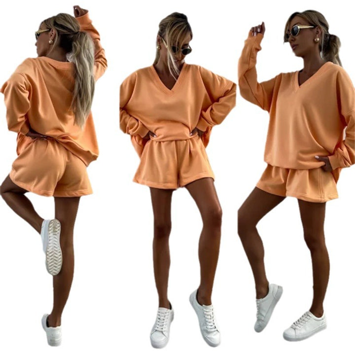 Casual outfit for women with oversized V-neck sweater and shorts Lune London