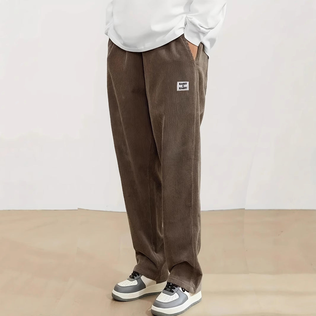 Women's wide corduroy trousers with elastic waistband and side pockets Chic & Stil