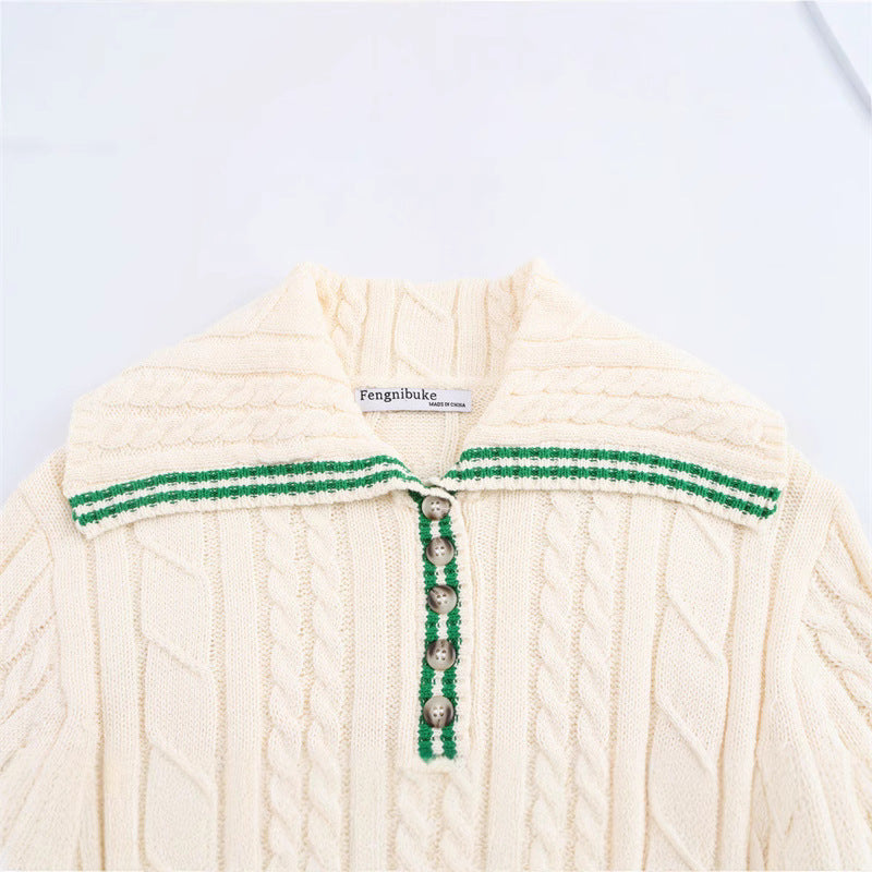Knitted sweater for women with high collar and button placket Chic und Stil