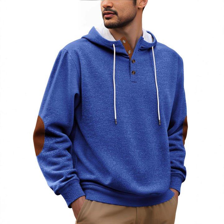 Hooded man with modern design of button placket and elbow patches Lune London