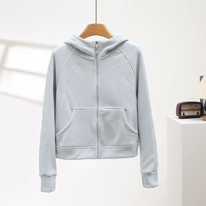 Veste à capuche confortable pour femme avec col montant et poches pratiques Chic & Stil