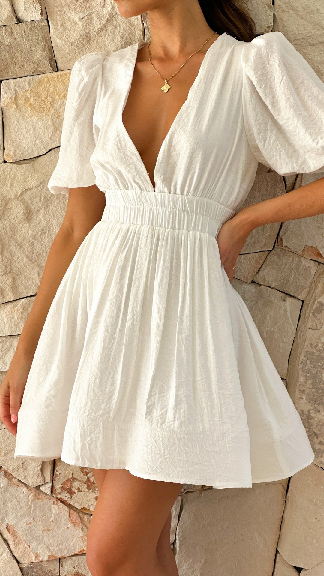 Lune London | Mini dress with V-neck and puff sleeves for women
