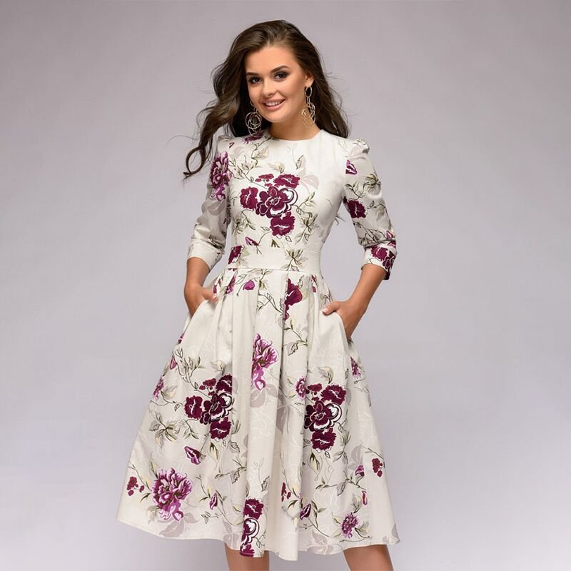 Lune London | Casual mid-length dress with round neck floral print and pockets