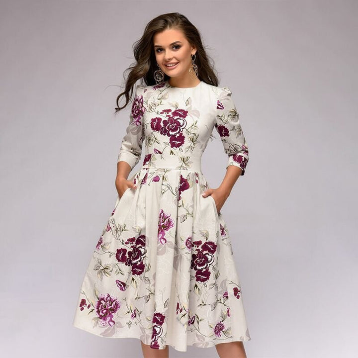 Lune London | Casual mid-length dress with round neck floral print and pockets