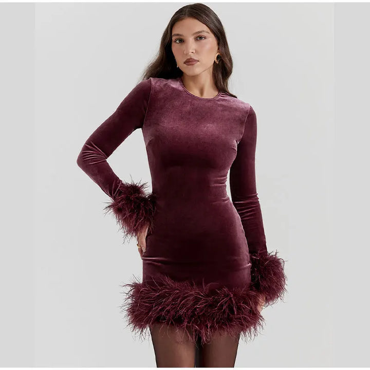 Lune London | Elegant fitted dress with feather embellishments on the sleeves