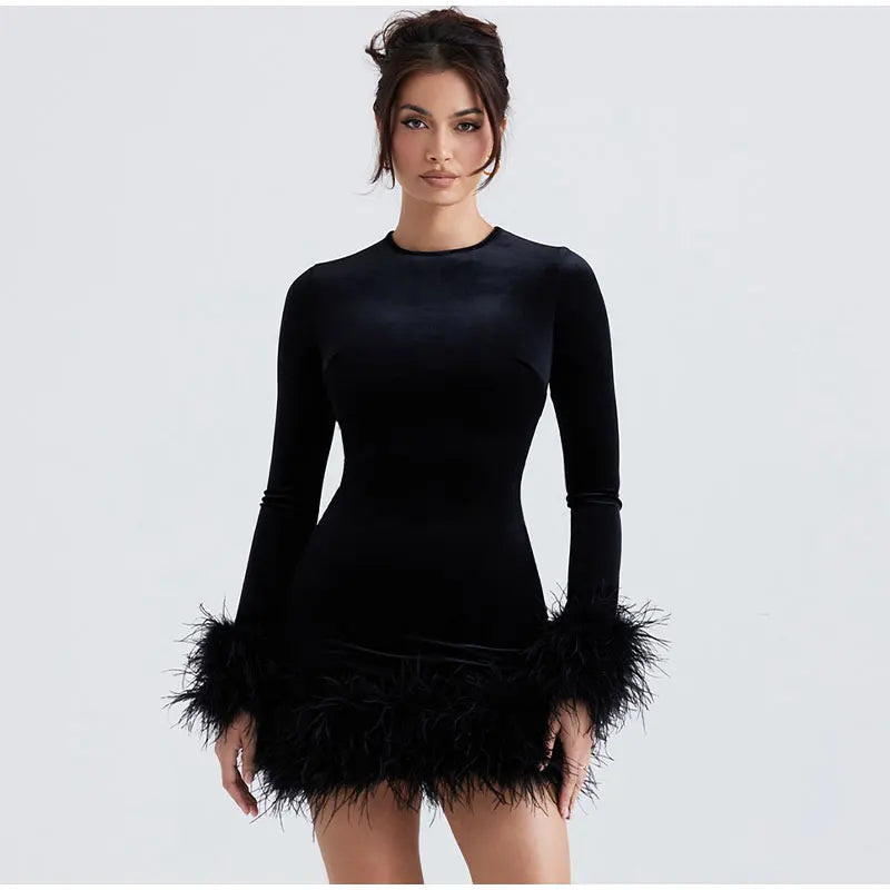 Lune London | Elegant fitted dress with feather embellishments on the sleeves