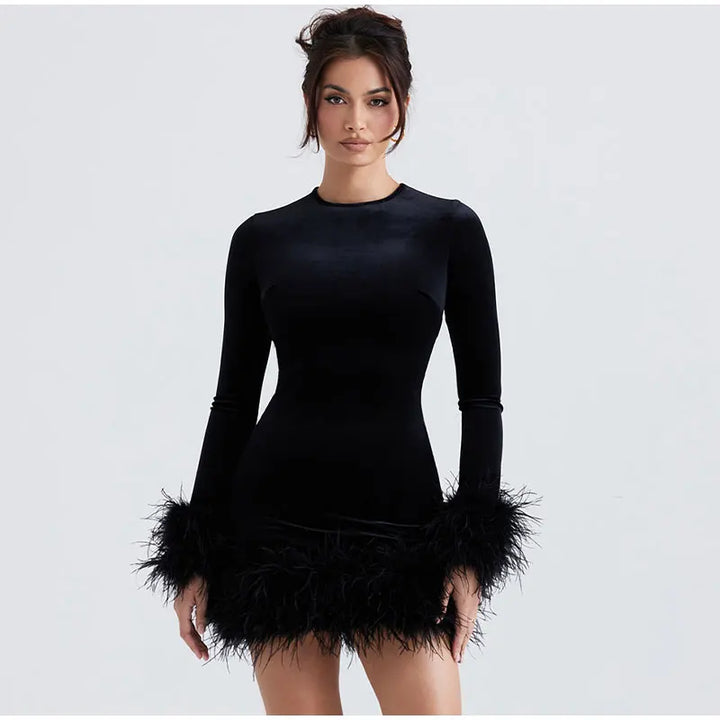 Lune London | Elegant fitted dress with feather embellishments on the sleeves