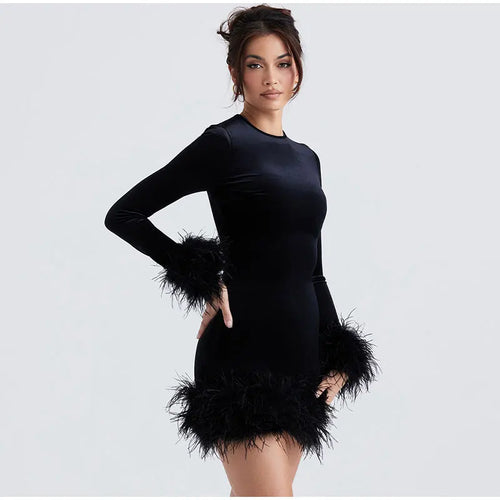 Lune London | Elegant fitted dress with feather embellishments on the sleeves