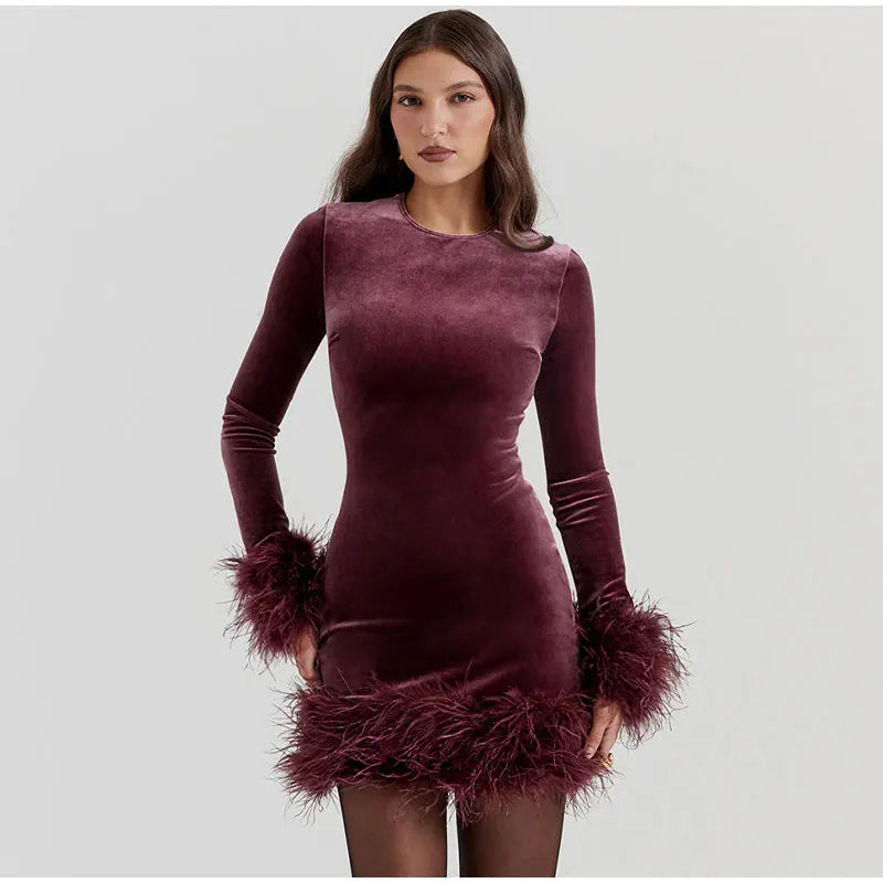 Lune London | Elegant fitted dress with feather embellishments on the sleeves