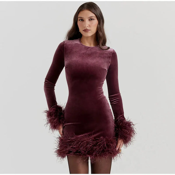 Lune London | Elegant fitted dress with feather embellishments on the sleeves