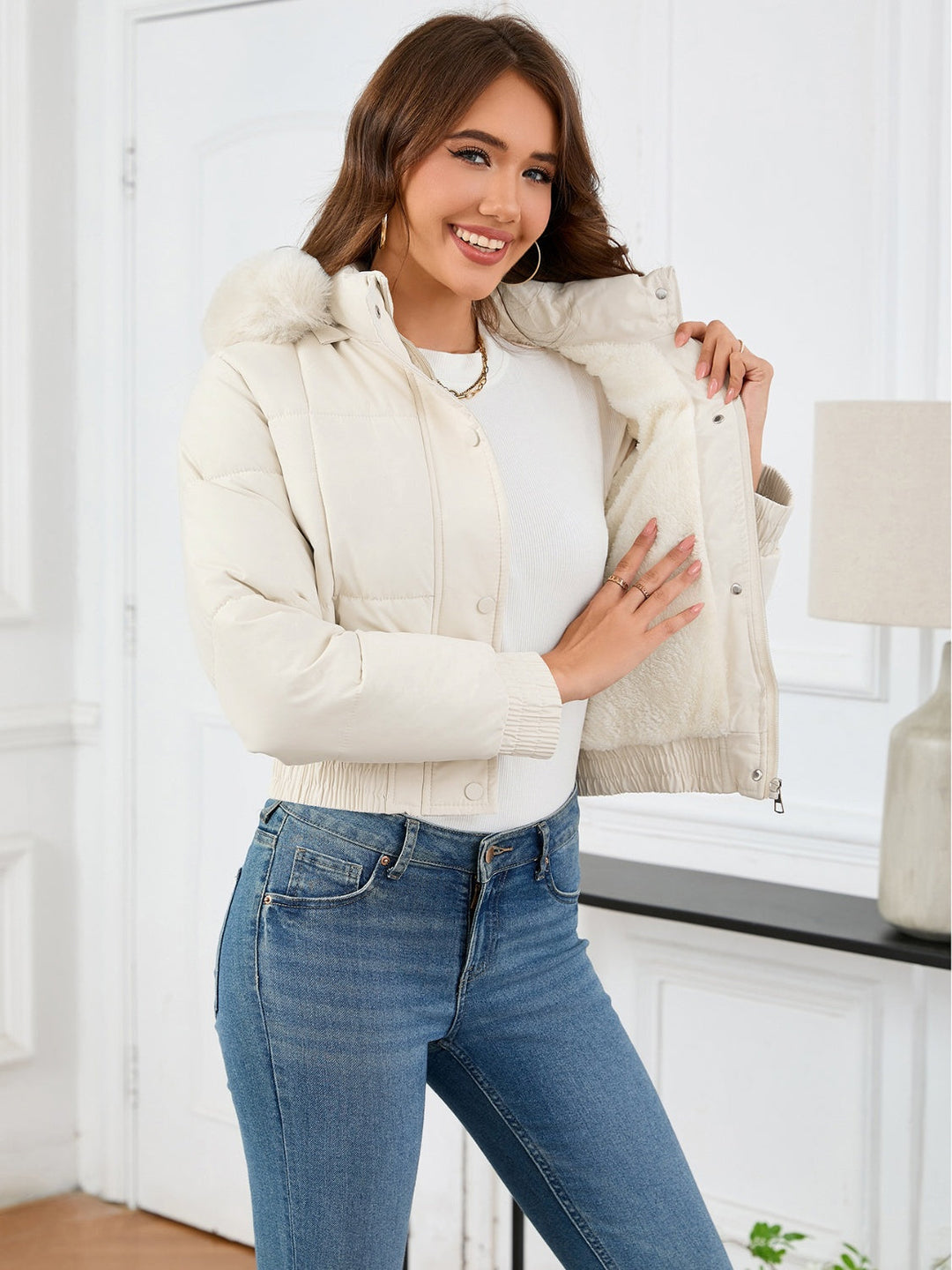 Chic und Stil | Cozy padded winter jacket with fur hood and pockets