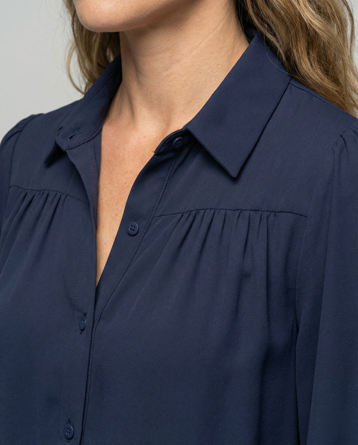 Ladies blouse with voluminous sleeves and elegant ruffle details