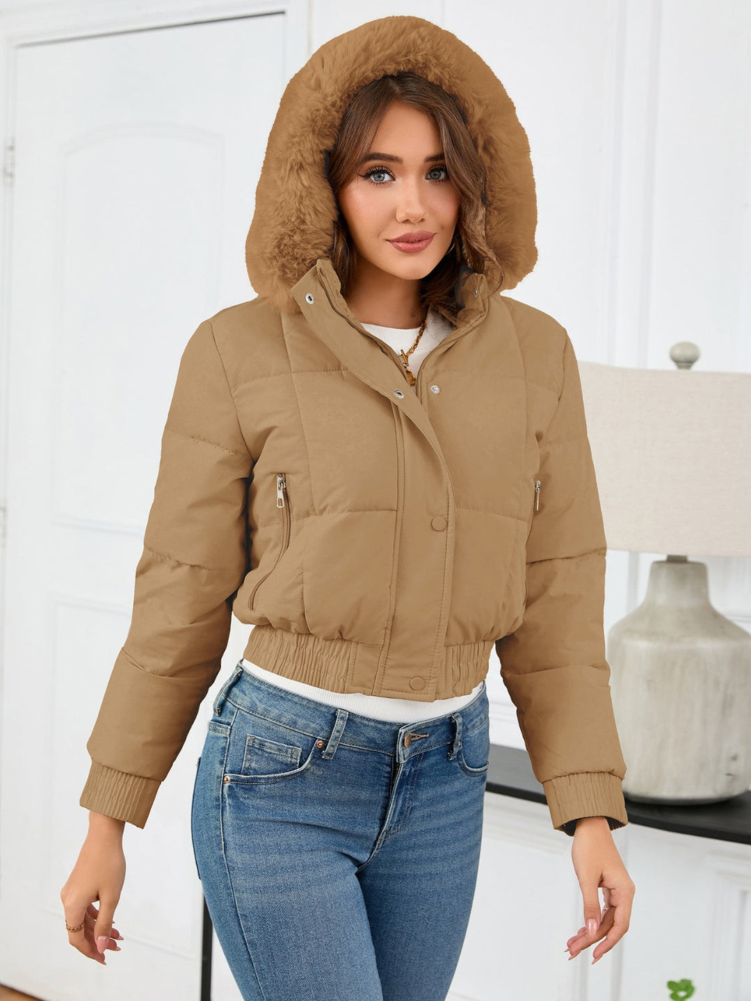 Chic und Stil | Cozy padded winter jacket with fur hood and pockets