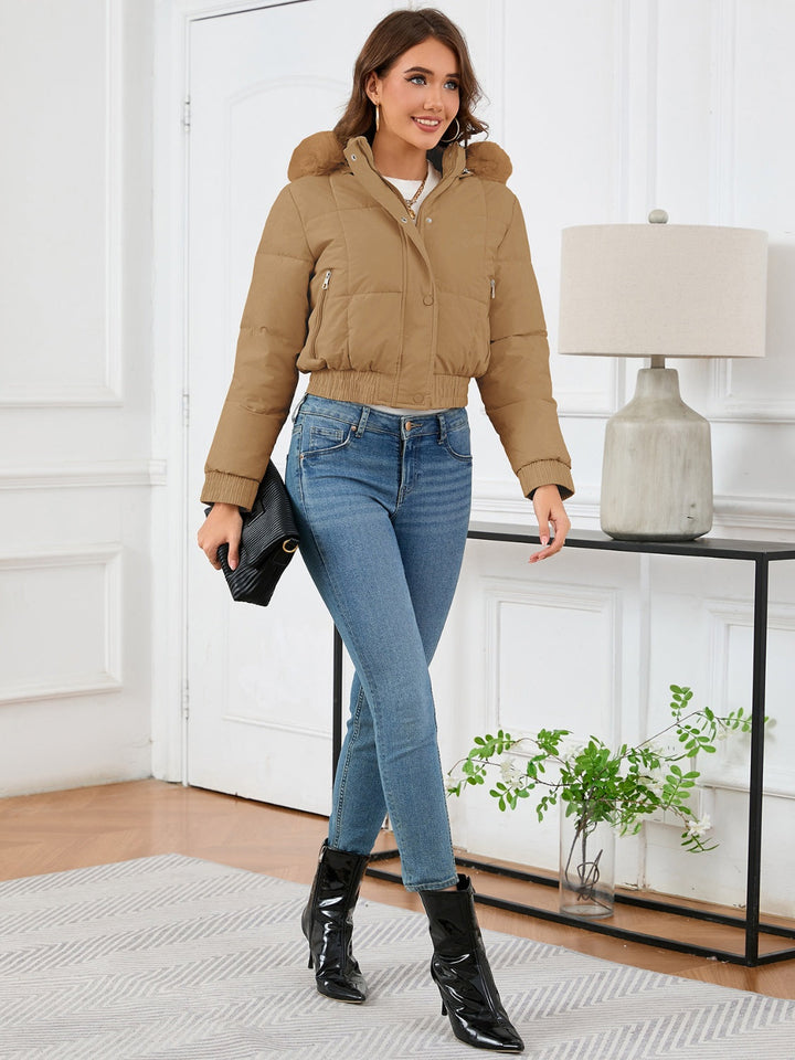 Chic und Stil | Cozy padded winter jacket with fur hood and pockets