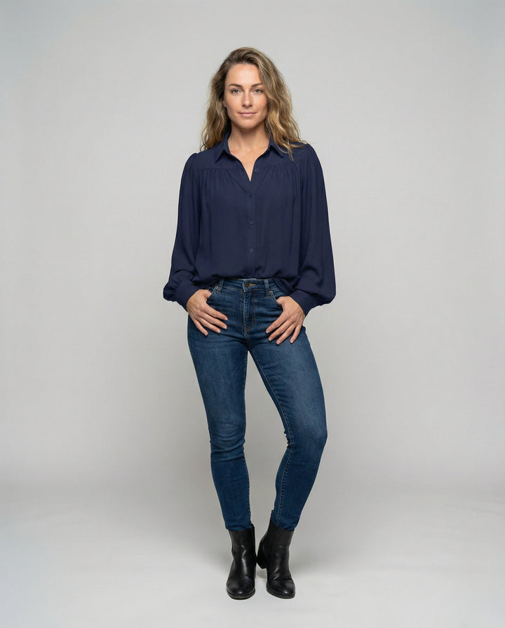 Ladies blouse with voluminous sleeves and elegant ruffle details