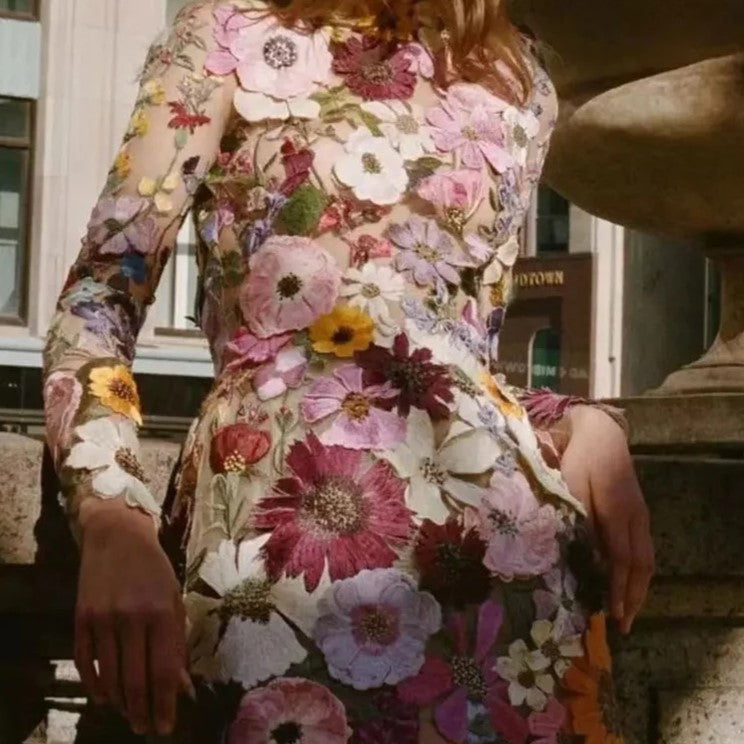 Lune London | Mini dress with floral appliqués and a sheer look