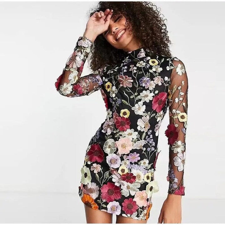 Lune London | Mini dress with floral appliqués and a sheer look