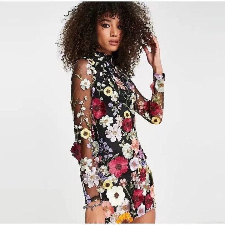 Lune London | Mini dress with floral appliqués and a sheer look