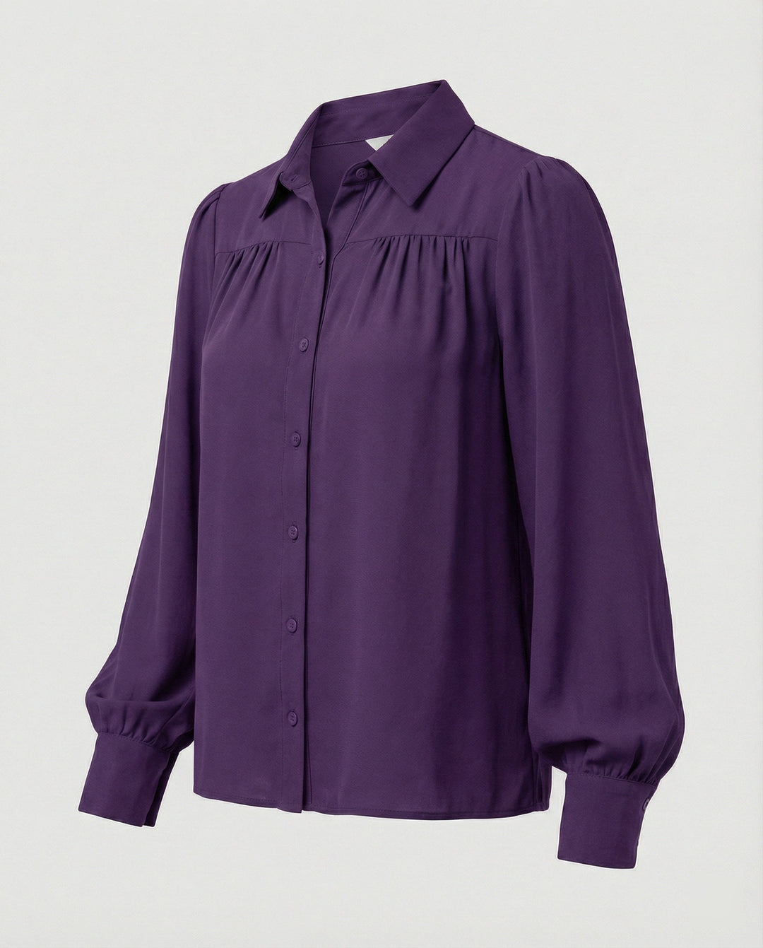 Ladies blouse with voluminous sleeves and elegant ruffle details