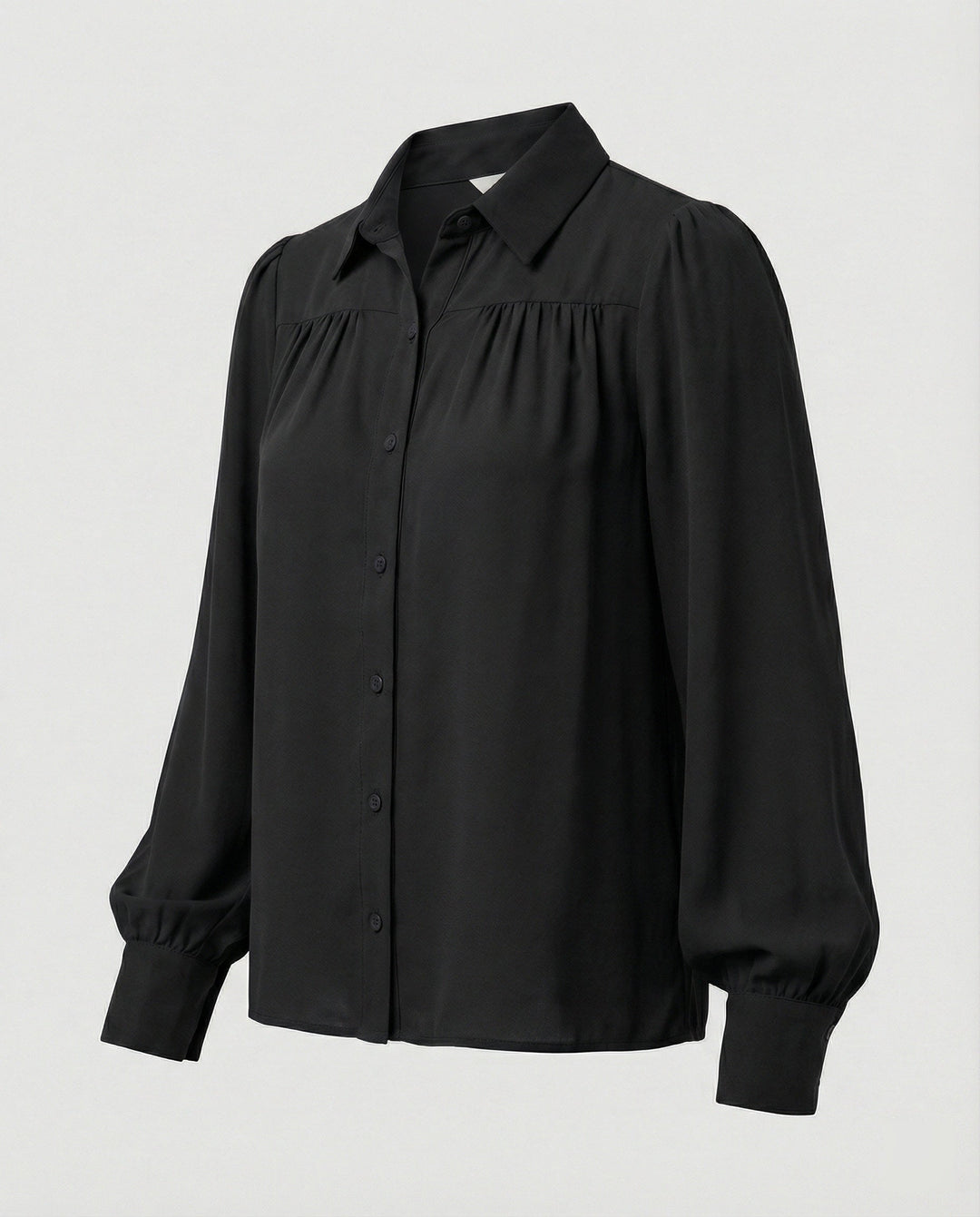 Ladies blouse with voluminous sleeves and elegant ruffle details