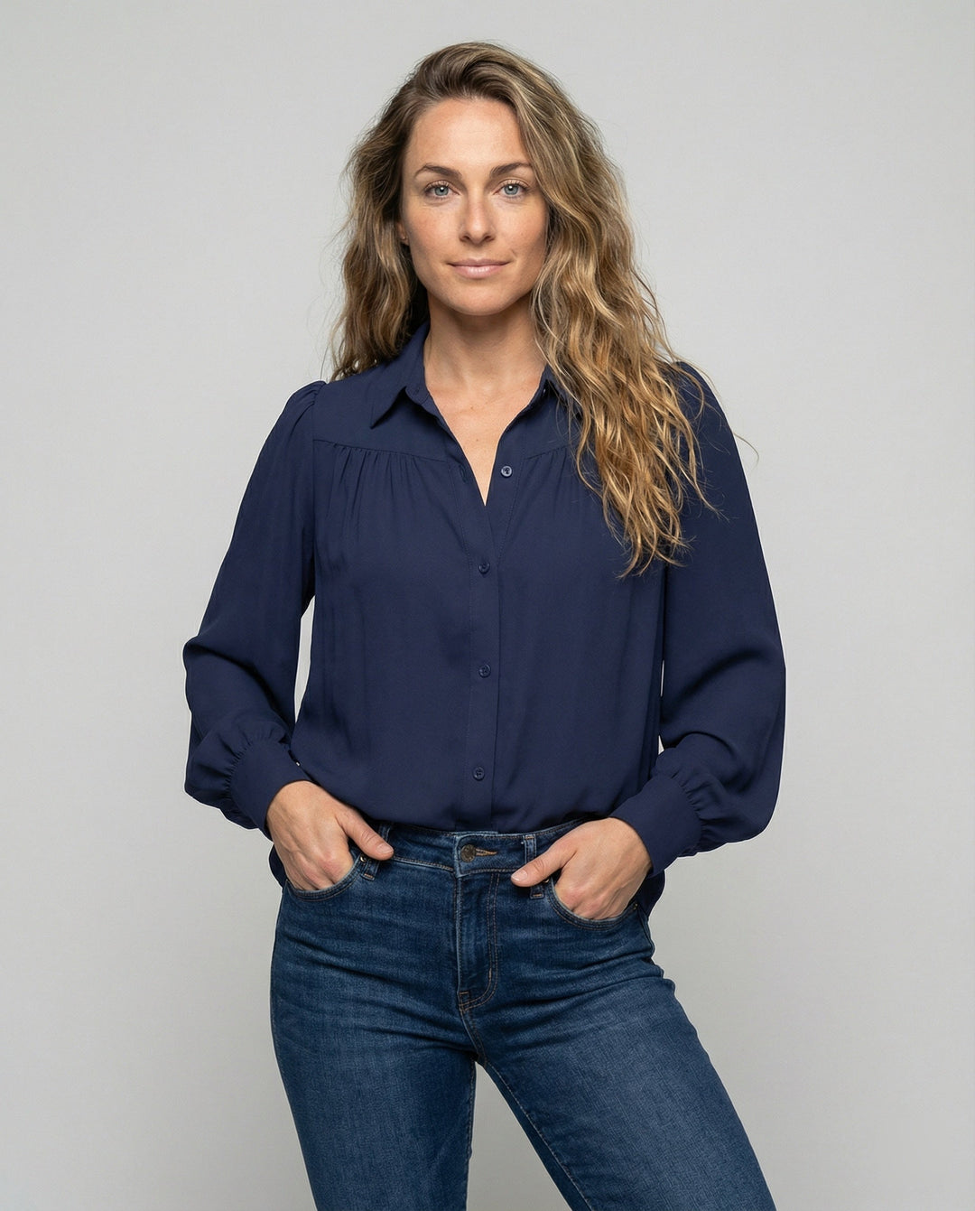 Ladies blouse with voluminous sleeves and elegant ruffle details